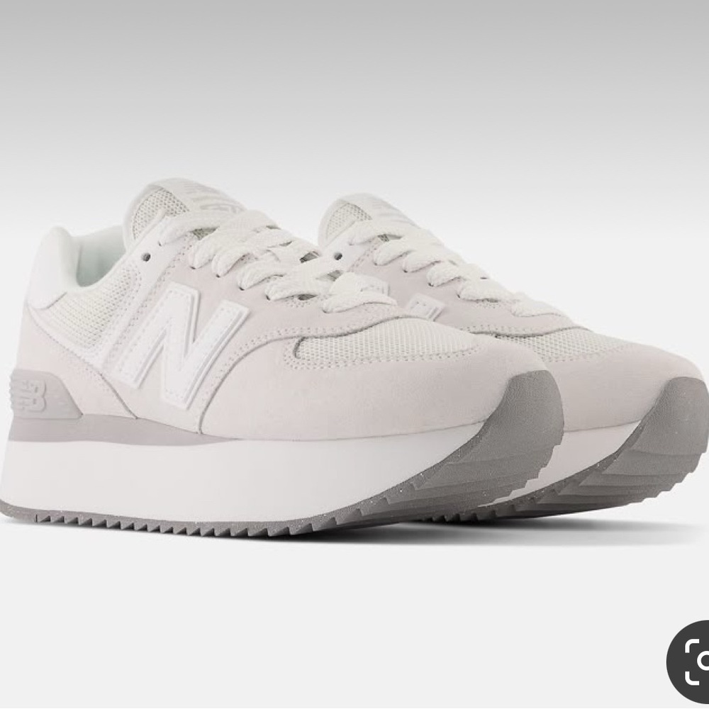Women’s size 7 platform new balance shoes. Only worn twice.
